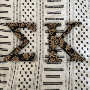 Sigma Kappa black / gold hand painted letters